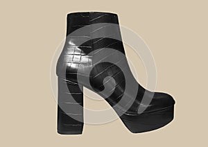 Platform women`s snakeskin boots