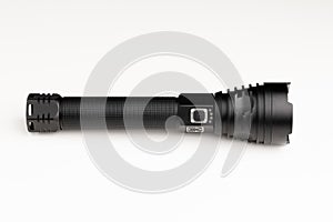 Black pocket flashlight, white background