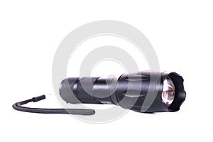 Black police flashlight with strap isolated on white background