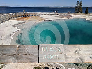 Black Pool with sign at Yellowstone National Park