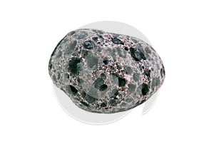 Black porous basalt stone on a white background