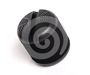 Black portable bluetooth speaker, isolated on white