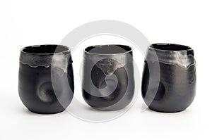 Black pottery cups