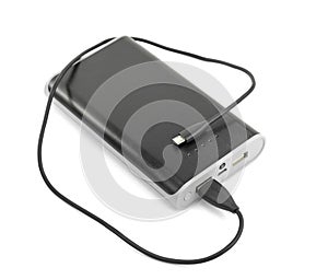Black power bank Charger isolated on white background. Power bank for charging mobile devices.