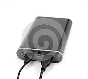 Black power bank Charger isolated on white background. Power bank for charging mobile devices.