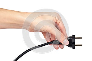 Black power plug, electric connector with cable in hand. Isolated on white backgorund