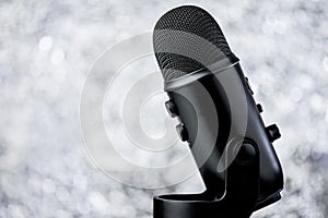 Black Profesional Microphone On Blurred Background