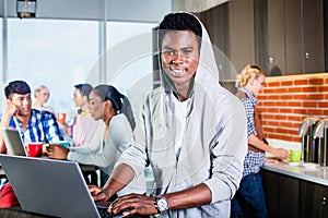 Black programmer in lounge of IT start-up