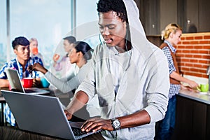 Black programmer in lounge of IT start-up