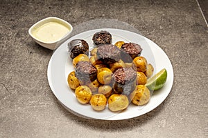 black pudding from burgos with rice accompanied by wrinkled