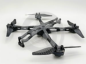 A black quadcopter with four propellers photo