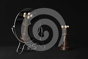 Black queen admiring himself