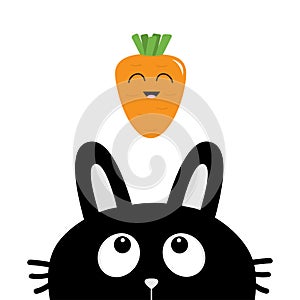 Black rabbit bunny face head silhouette looking up to smiling carrot vegetable. Cute cartoon funny character. Kawaii animal.