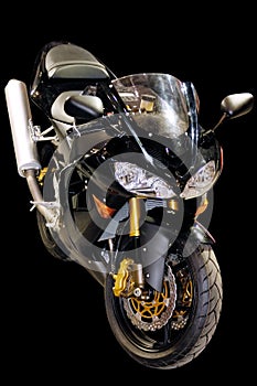 Black racing motorcycle isolated photo