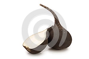 Black radish with half isolated on white background