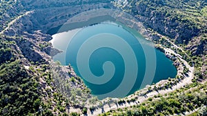 Black or Radon Lake in the Nikolaev region of Ukraine from a bird\'s eye view. Flooded granite quarry, aerial view, landscape