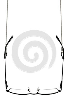 Black reading glasses, grey eyeglasses straps retainers, isolated hanging readers croakies, blank empty vertical copy space