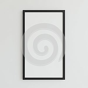 Black rectangular frame with a minimalistic design set against a plain white wall. The