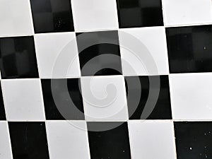 Black rectangular tiles create a symmetrical pattern on the wall