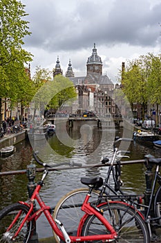 Bikes over the bridge in amsterdam canal