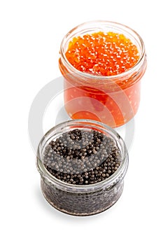 Black and red caviar in glass cans isolated on white background. Sturgeon and salmon caviar