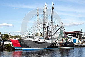 Black and Red Fishing Boats Front photo