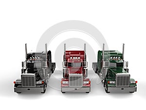Black, red, and green classic eighteen wheeler trucks without trailers - top down view