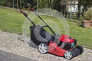 Black Red Lawnmower Outdoor Shot