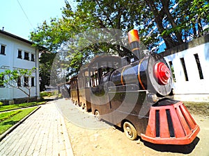 black and red train in lawang sewu