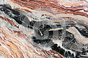 Black, red, whire, brown patterned natural marble texture.
