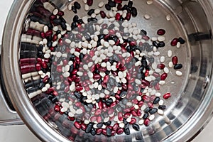 Colored beans in a saucepan