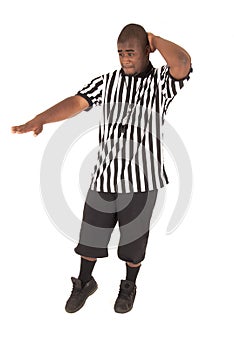 Black referee calling a charging foul