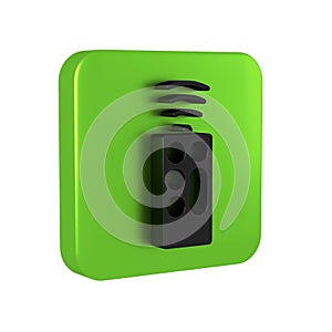 Black Remote control icon isolated on transparent background. Green square button.