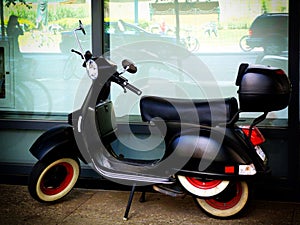 Black Retro Scooter with Red Wheels