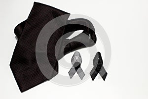 Black ribbon and black necktie; decoration black ribbon hand made artistic design for sadness expression isolated on white