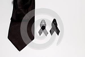 Black ribbon and black necktie; decoration black ribbon hand made artistic design for sadness expression isolated on white