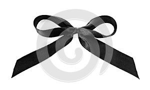 Black ribbon bow on white background. Funeral symbol