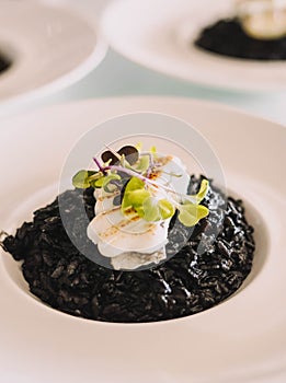 Black rice with cuttlefish and squid ink photo