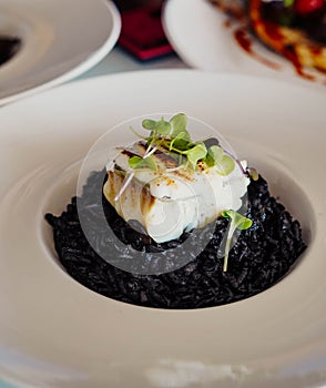 Black rice with cuttlefish and squid ink photo