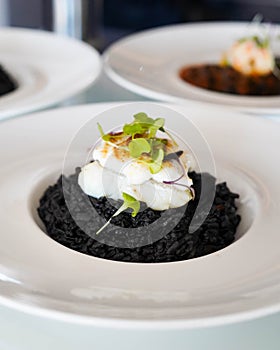 Black rice with cuttlefish and squid ink photo