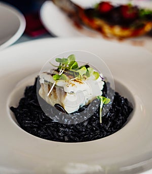 Black rice with cuttlefish and squid ink photo