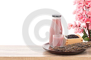 Black Rice or Oryza sativa are fermented to make Amazake, sake or rice wine isolated on white background