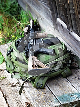 The Black Rifle on a backpack