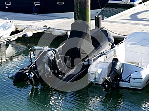 Black rigid hull boat photo