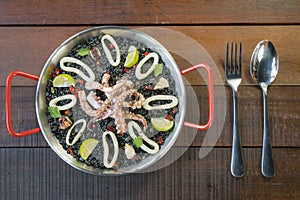 Black risotto with squid and ink sauce