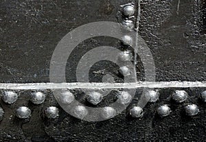 Black Rivet Joints Industrial Background photo