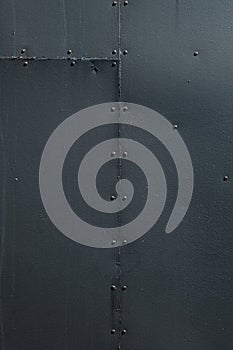 Black Riveted Sheet Metal Background