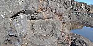 Black rock with a river or mountain, nature landscapes, Lakhnadon India, picture taken on February 2018,landscapes background