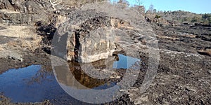 Black rock with water and mountain nature landscapes, Lakhnadon India, picture taken on February 2018,landscapes background.