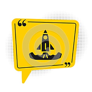 Black Rocket icon isolated on white background. Yellow speech bubble symbol. Vector